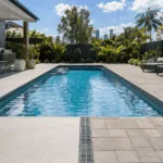 Pavers vs Concrete Around Pool Areas in Brisbane: Drainage, Performance, and Longevity